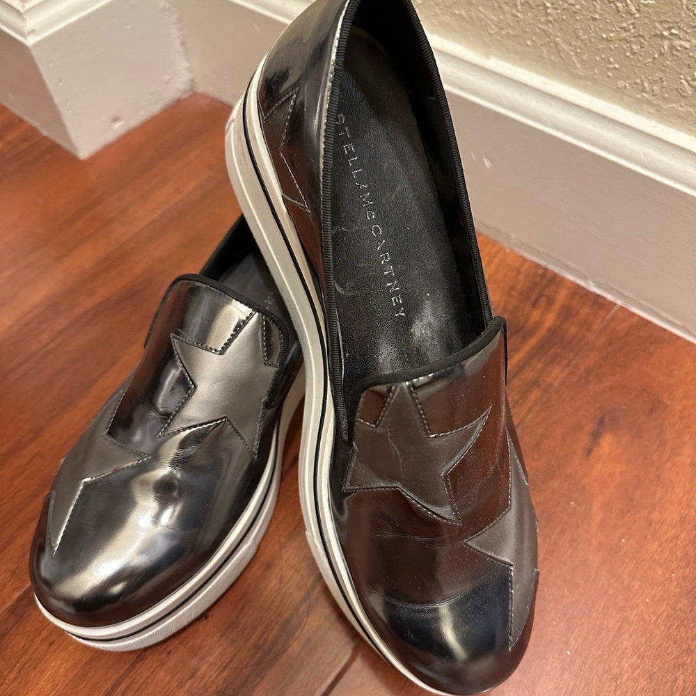 Stella McCartney slip on shoes silver with stars. Used but in great condition